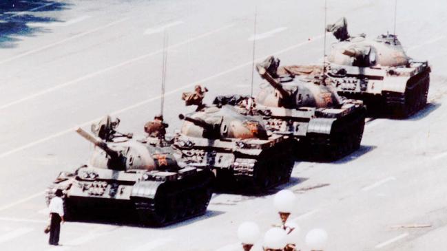 An anti-government protester in front of artillery tanks in Beijing's Tiananmen Square in 1989, at the height of pro-democracy protests. Picture: Jeff Widener/AP