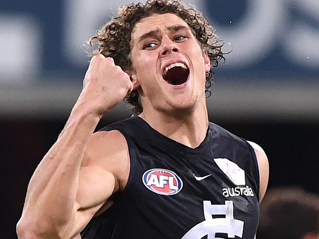 Charlie Curnow of the Blues reacts after kicking a goal during the Round 19 AFL match between the Gold Coast Suns and the Carlton Blues at Metricon Stadium at Carrara on the Gold Coast, Saturday, July 28, 2018. (AAP Image/Dave Hunt) NO ARCHIVING, EDITORIAL USE ONLY