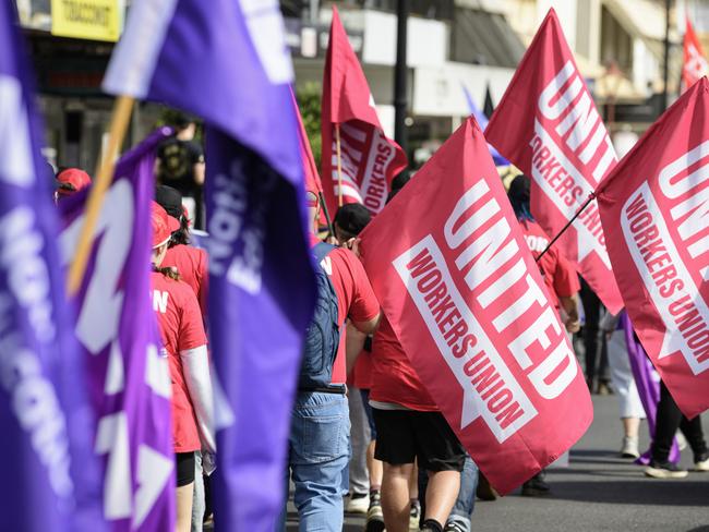 United Workers Union signs are displayed in the Toowoomba Labour Day March, Saturday, May 3, 2025. Picture: Kevin Farmer