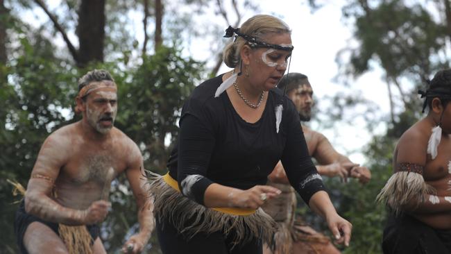 Amanda Donovan performs with the Wajaar Ngaarlu Dance Troupe at Sealy Lookout in Coffs Harbour as part of the Giingan Gumbaynggirr Cultural Experience. Photo: Tim Jarrett