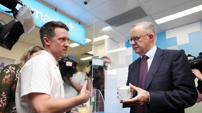 Labor leader Anthony Albanese talking with pharmacist Ross Diebert Picture: Liam Kidston