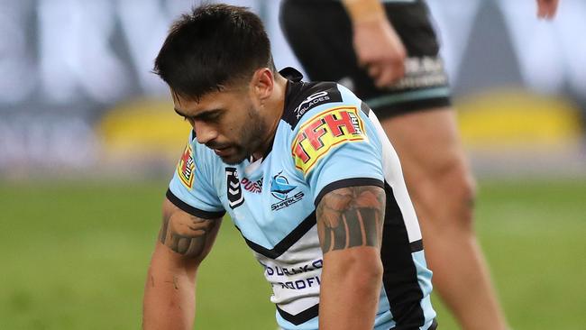 A dejected Shaun Johnson of Cronulla after kicking the ball out on the full close to full time in the Bulldogs v Cronulla NRL match at ANZ Stadium, Homebush. Picture: Brett Costello