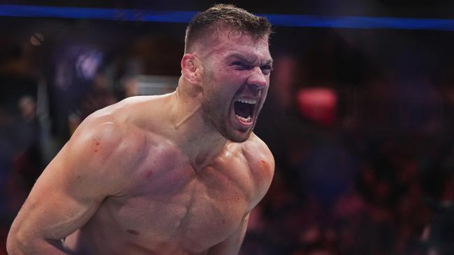 LAS VEGAS, NEVADA - JULY 08: Dricus Du Plessis of South Africa reacts after his knockout victory over Robert Whittaker of New Zealand in a middleweight fight during the UFC 290 event at T-Mobile Arena on July 08, 2023 in Las Vegas, Nevada. (Photo by Cooper Neill/Zuffa LLC via Getty Images)