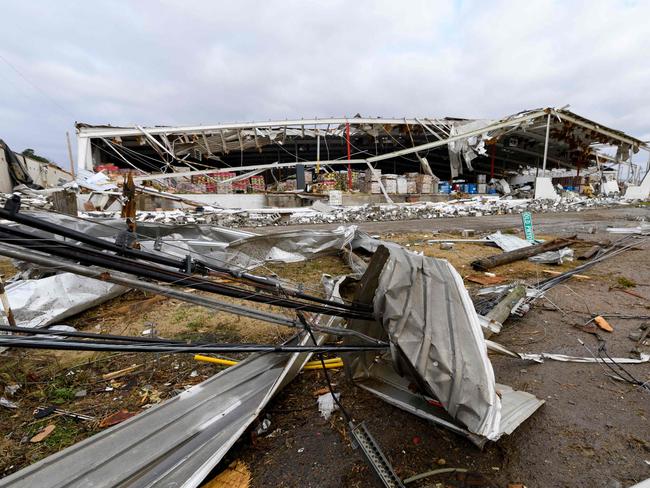 A warehouse lies damaged after it was hit by a tornado in Mayfield, Kentucky. Picture: AFP