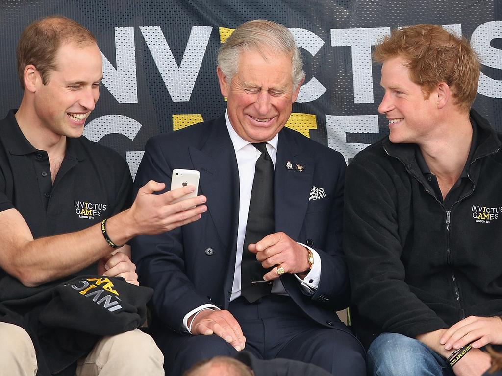 Prince William, King Charles and Prince Harry at the Invictus Games in 2014. Almost a decade on and Harry is estranged from his father and brother. Picture: Getty Images