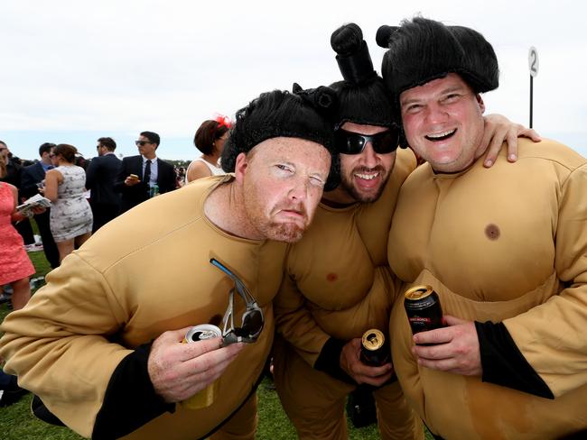 Sumo Owen with Peter and Mick at the 2014 Melbourne Cup. Picture: Tim Carrafa