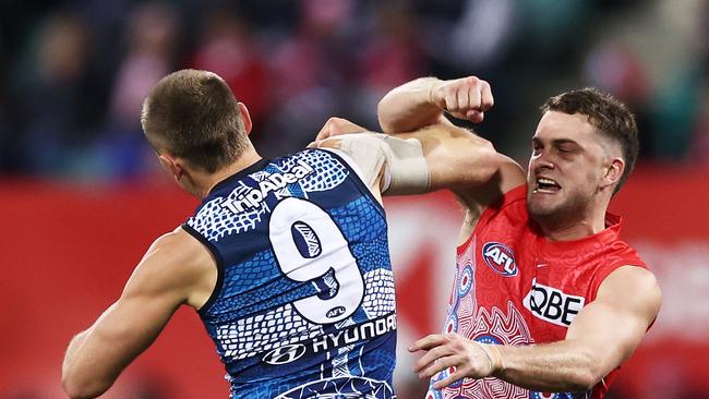 SYDNEY, AUSTRALIA – MAY 26: Tom Papley of the Swans challenges Patrick Cripps of the Blues after kicking a goal during the round 11 AFL match between Sydney Swans and Carlton Blues at Sydney Cricket Ground, on May 26, 2023, in Sydney, Australia. (Photo by Matt King/AFL Photos/via Getty Images )