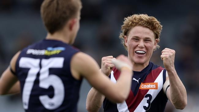 MELBOURNE, AUSTRALIA - SEPTEMBER 21: Levi Ashcroft of the Dragons celebrates a goal during the 2024 Coates Talent League Boys Grand Final match between the Sandringham Dragons and GWV Rebels at IKON Park on September 21, 2024 in Melbourne, Australia. (Photo by Martin Keep/AFL Photos via Getty Images)