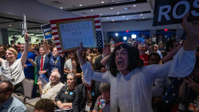 A Libertarian party member shouts protests as Donald Trump addresses the Libertarian National Convention in Washington. Picture: Jim Watson/AFP