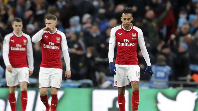 Arsenal's Pierre-Emerick Aubameyang, center, reacts after Manchester City score.