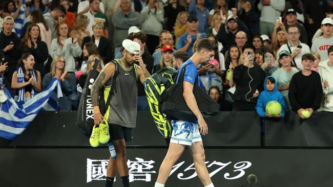 Nick Kyrgios and Thanasi Kokkinakis leave John Cain Arena after retiring in the men's double. Picture: Cameron Spencer/Getty Images