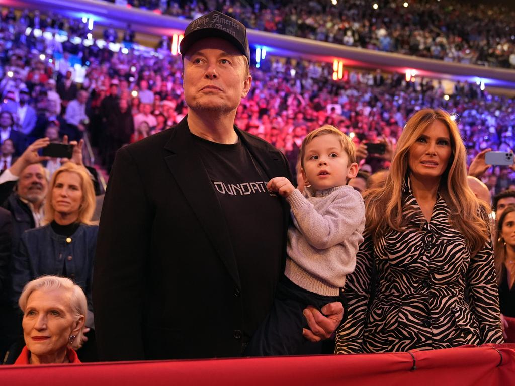 Elon Musk and first lady Melania Trump listen at one of Donald Trump’s campaign rallies. Picture: AP