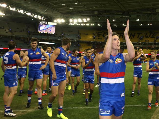 Bob Murphy leads the Bulldogs off the field Picture: Wayne Ludbey