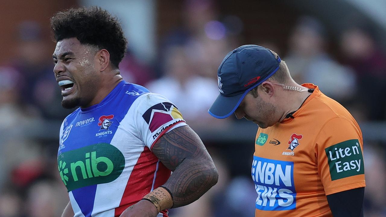 SYDNEY, AUSTRALIA - JULY 14: Greg Marzhew of the Knights is attended to by a trainer during the round 19 NRL match between Manly Sea Eagles and Newcastle Knights at 4 Pines Park on July 14, 2024 in Sydney, Australia. (Photo by Jason McCawley/Getty Images)