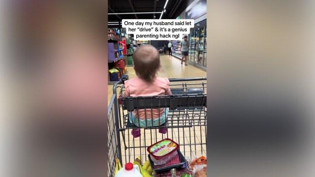 Letting the toddler drive is the dad's solution to toddler tantrums at the shops. Photo: TikTok