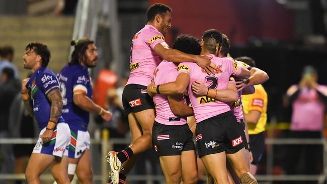 The Panthers celebrate one of their seven tries against the Warriors. Picture: Albert Perez/Getty Images