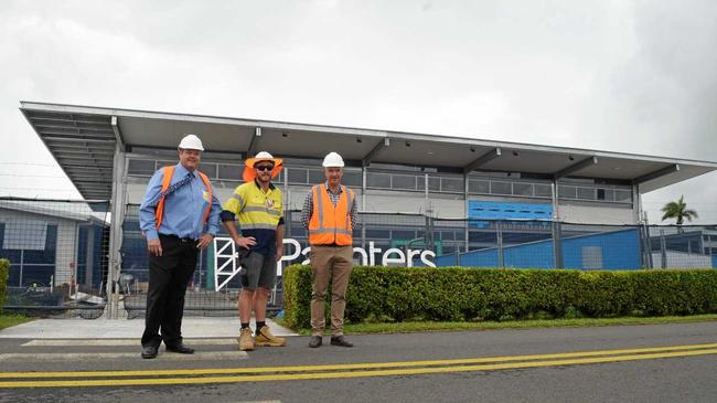 AIRPORT FACELIFT: Mayor Andrew Willcox, Paynters site foreman Ben Dreger and council's director of major projects Tim Rose outside the upgraded Whitsunday Coast Regional Airport departure lounge. Picture: Georgia Simpson