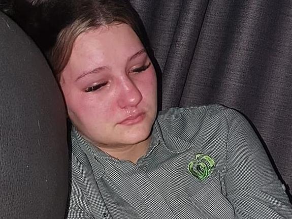 Jordyn Nydrle's mother Debara posted a picture of her holding back tears after getting "abused" by customers at a Townsville Woolworths. Picture: Facebook