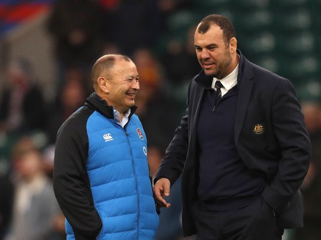 (L-R) Eddie Jones (L) and Michael Cheika have been mates since their playing days at Randwick. Picture: AFP