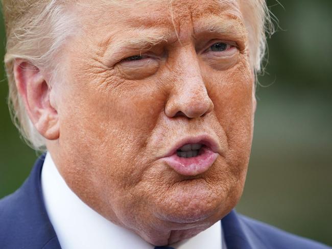 US President Donald Trump speaks to the press as he makes his way to board Marine One from the South Lawn of the White House in Washington, DC on September 24, 2020. - Trump is on a two-day campaign swing through North Carolina and Florida. (Photo by MANDEL NGAN / AFP)