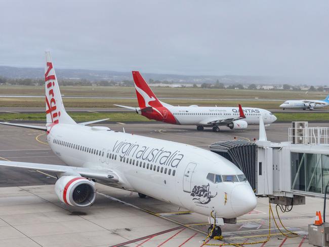 ADELAIDE, AUSTRALIA - NewsWire Photos SEPTEMBER 22, 2021: Virgin, Qantas and Cobham aircraft at Adelaide Airport. Picture: NCA NewsWire /Brenton Edwards