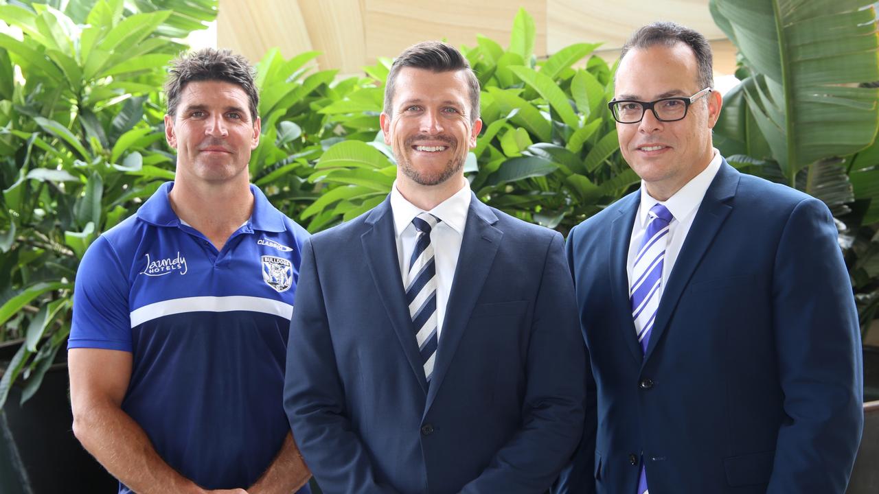 Bulldogs CEO Aaron Warburton (C) with former coach Trent Barrett (L) and chair John Khoury. Source: Supplied.