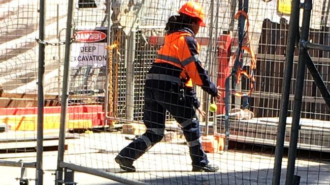 A little solo handball to fight off boredom at Devonshire St. Picture: Rose Brennan