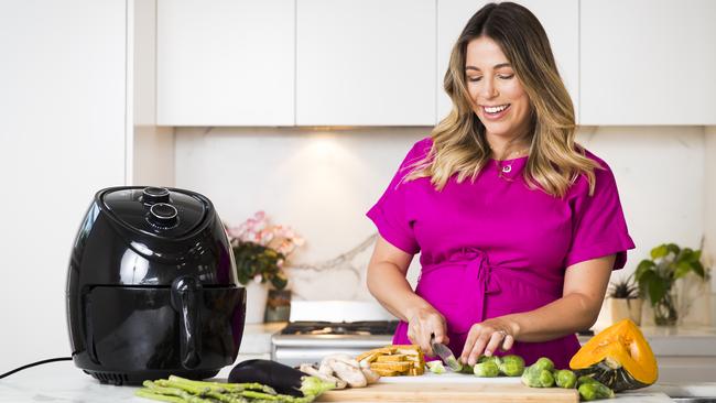 Lyndi Cohen pictured at home with her air fryer. Picture: Dylan Robinson