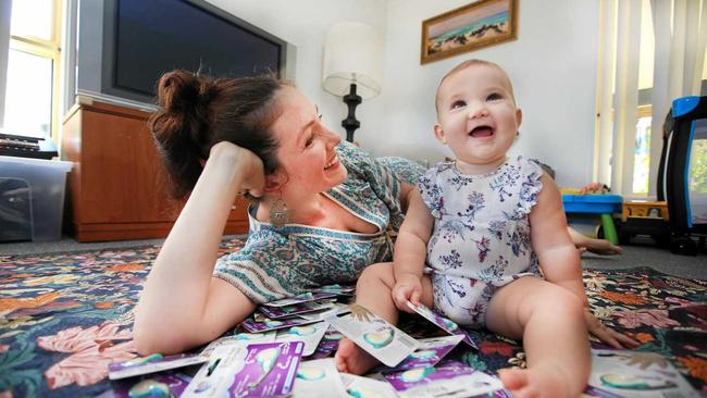 Julie Christie with daughter Liandra from Tweed Heads is the inventor of the Nail Snail, a nifty device that trims baby an infant nails with ease. Picture: Scott Powick