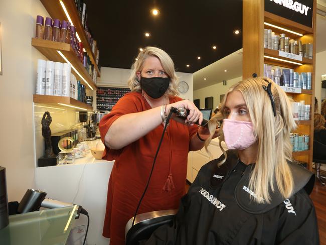 29/01/2021. Bondi hair salon Toni & Guy owner Kelly Prestia with client Sophia Wilson at her salon in Bondi beach in Sydney's eastern suburbs. Search engine Google has threatened to pull its service from Australia which could impact small business customer base. Britta Campion / The Australian