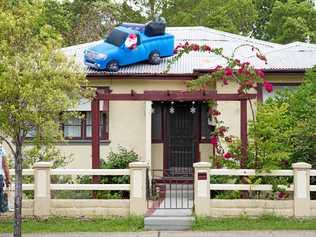 PHOTO SMART: Just in case your home does not sell before December 25, get all the photos taken before putting the Santa Car on the roof. Picture: Trevor Veale