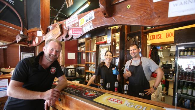 KC's Bar and Grill owner Geoff Small and employees Amy Dolman and Gus Yarrow were loving having people in the doors.