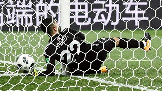 Tunisia's goalkeeper Mouez Hassen injures his shoulder early against England. Picture: AFP