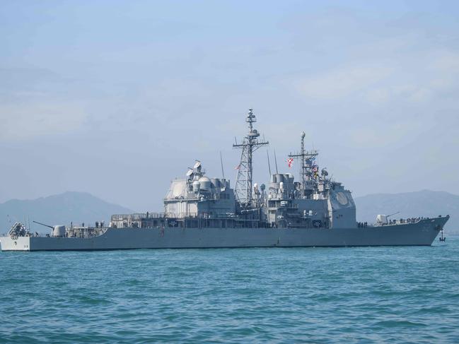 (FILES) In this file photo taken on November 21, 2018, the US Navy's USS Chancellorsville, guided missile destroyer,  in Hong Kong. - China on November 30, 2018, scolded the US for sending naval vessels close to disputed islands in the South China Sea where Beijing has built military installations. According to the Pentagon, the  Chancellorsville sailed November 26  near the Paracel Islands, known as Xisha in Chinese. (Photo by ANTHONY WALLACE / AFP)