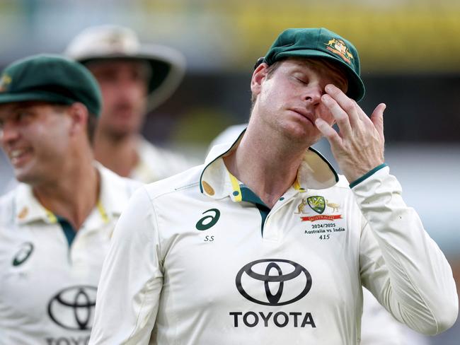 Australiaâ&#128;&#153;s Steve Smith reacts as he walks off the ground at the end of day four of the third cricket Test match between Australia and India at The Gabba in Brisbane on December 17, 2024. (Photo by DAVID GRAY / AFP) / -- IMAGE RESTRICTED TO EDITORIAL USE - STRICTLY NO COMMERCIAL USE --