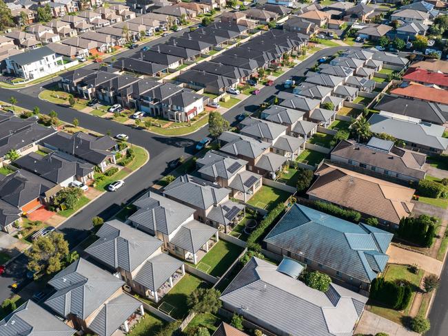 Aerial view of rows of mass produced 'cookie cutter' style homes build during the 2010s in outer suburban Sydney, Australia.