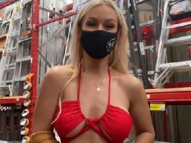 Woman strips, dances in bikini in Bunnings