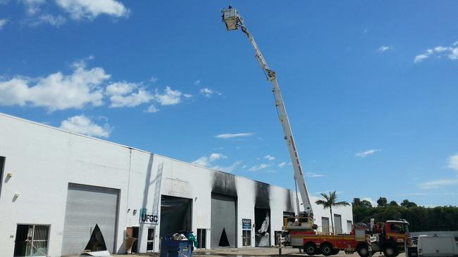 Fire and rescue investigators using cherry picker to inspect the damage from above PHOTO Scott Fletcher