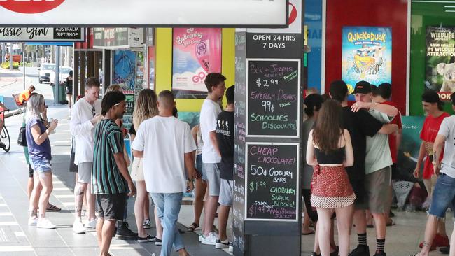 Friends of murder victim Jack Beasley gather to pay their respects at the scene of the tragedy outside the Surfers Paradise IGA. Photographer: Liam Kidston.