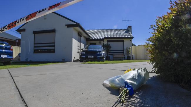 Friends laid flowers at the Woodville West home on Thursday morning. Picture: Roy VanDerVegt