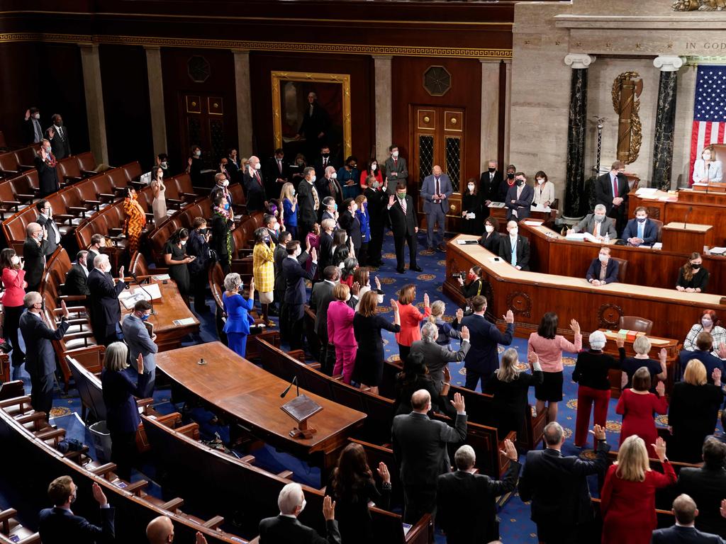 Democratic members of the US House of Representatives take their oath of office administered by Speaker of the House Nancy Pelosi on the floor of the House Chamber during the first session of the 117th Congress on Capitol Hill in Washington, DC, January 3, 2021. Picture: Erin Scott/AFP