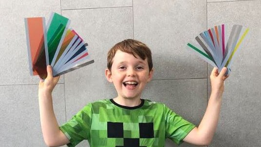 Levi and his 'reading rulers' are featured in Scott Pape’s new book Barefoot Kids: Your Epic Money Adventure! Picture: Supplied