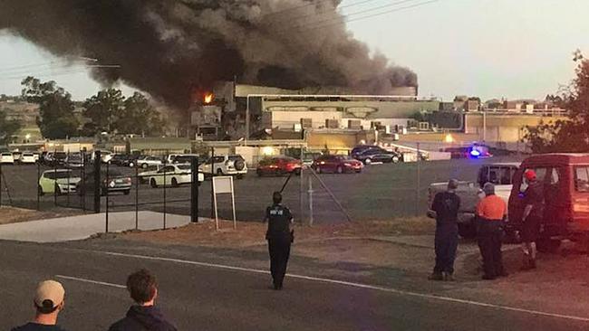 Staff and onlookers outside the Thomas Foods International's abattoir facility outside Murray Bridge. Picture: Facebook/Steven Pearson