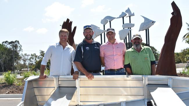 Andrew Ettingshausen, Pat Laws, Martin Spinks and prizewinner Rod Eddy at the new sculpture at Benaraby Caltex in 2017.