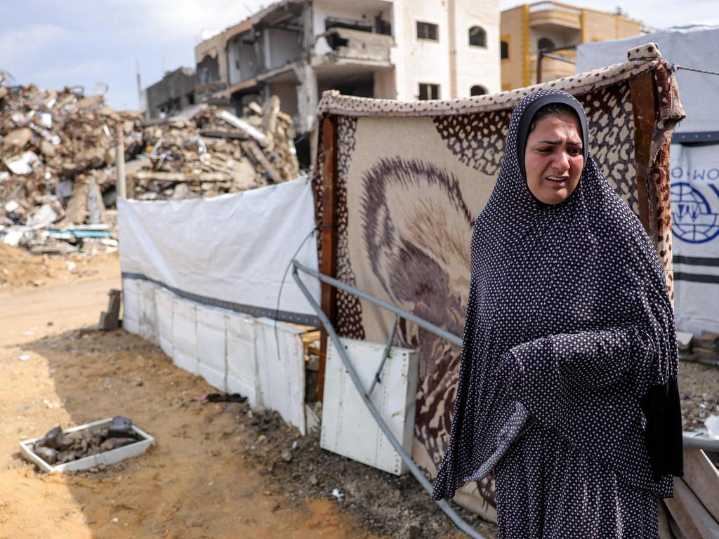 Sahar Karima, a displaced Palestinian woman, weeps in front of her soaked tent on a rainy day in Jabalia in the northern Gaza Strip on February 10, 2025. Picture: Bashar Taleb/AFP