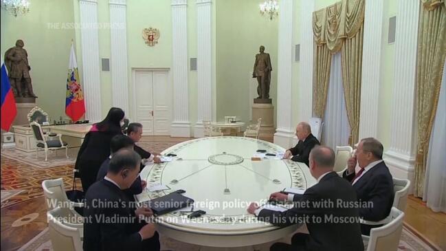 Russia, China showcase ties as Putin meets Wang