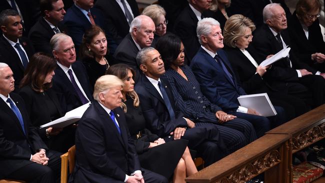 (From L-R) US President Donald Trump and First Lady Melania Trump are seated next to former president Barack Obama and Michelle Obama, former US president Bill Clinton and Hillary Clinton, and former president Jimmy Carter and Rosalynn Carter during the funeral service for former US president George H. W. Bush at the National Cathedral in Washington, DC on December 5, 2018. Picture: AFP