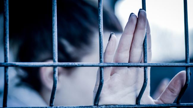 Girl behind bars. Picture: iStock