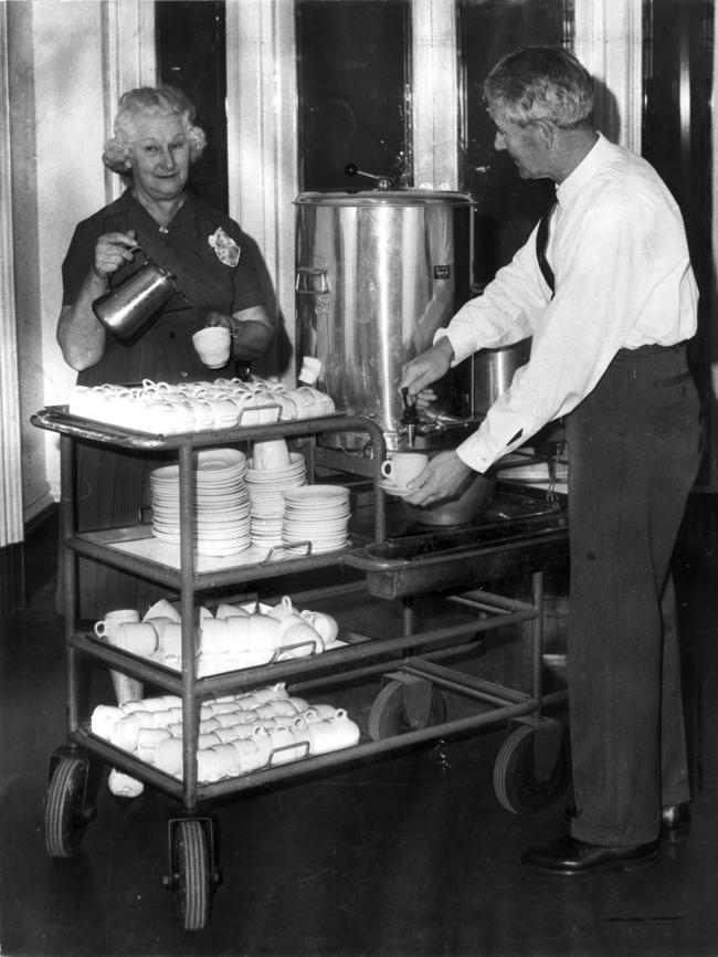 Tea lady Eve Wilson serves tea from her trolley in 1967.