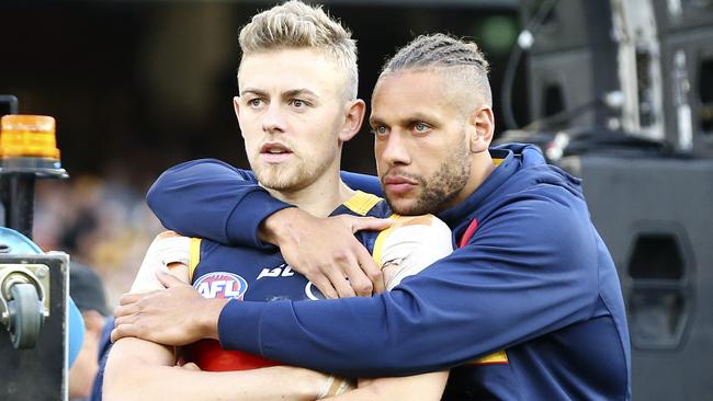 Hugh Greenwood with then injured Crow Cam Ellis-Yolmen after last year’s grand final loss. Picture Sarah Reed